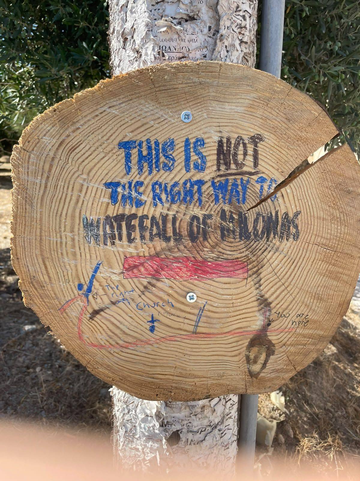 Sign to find the waterfall